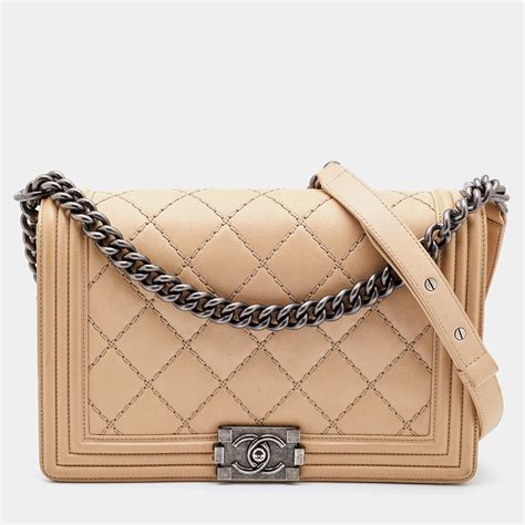 chanel quilted boy bag beige